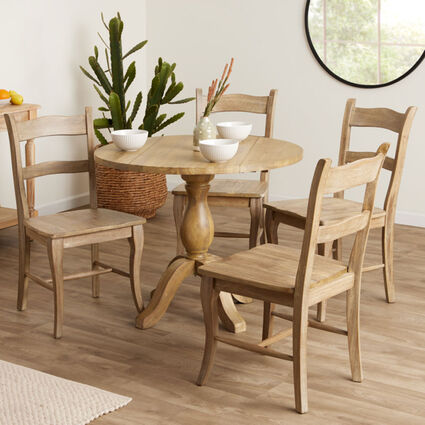 The wooden Jozy Drop-Leaf Dining Table with Jozy Dining Chairs