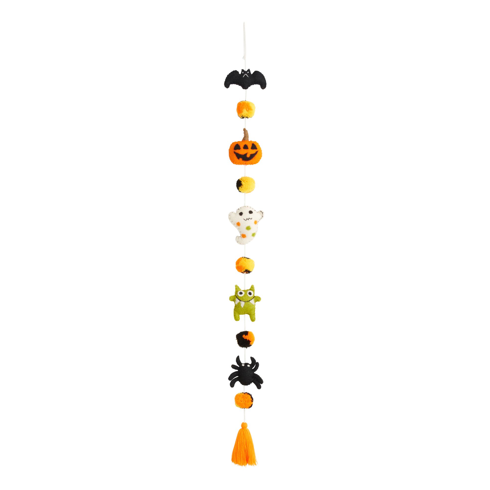 A hanging decoration with Halloween shaped icons on it