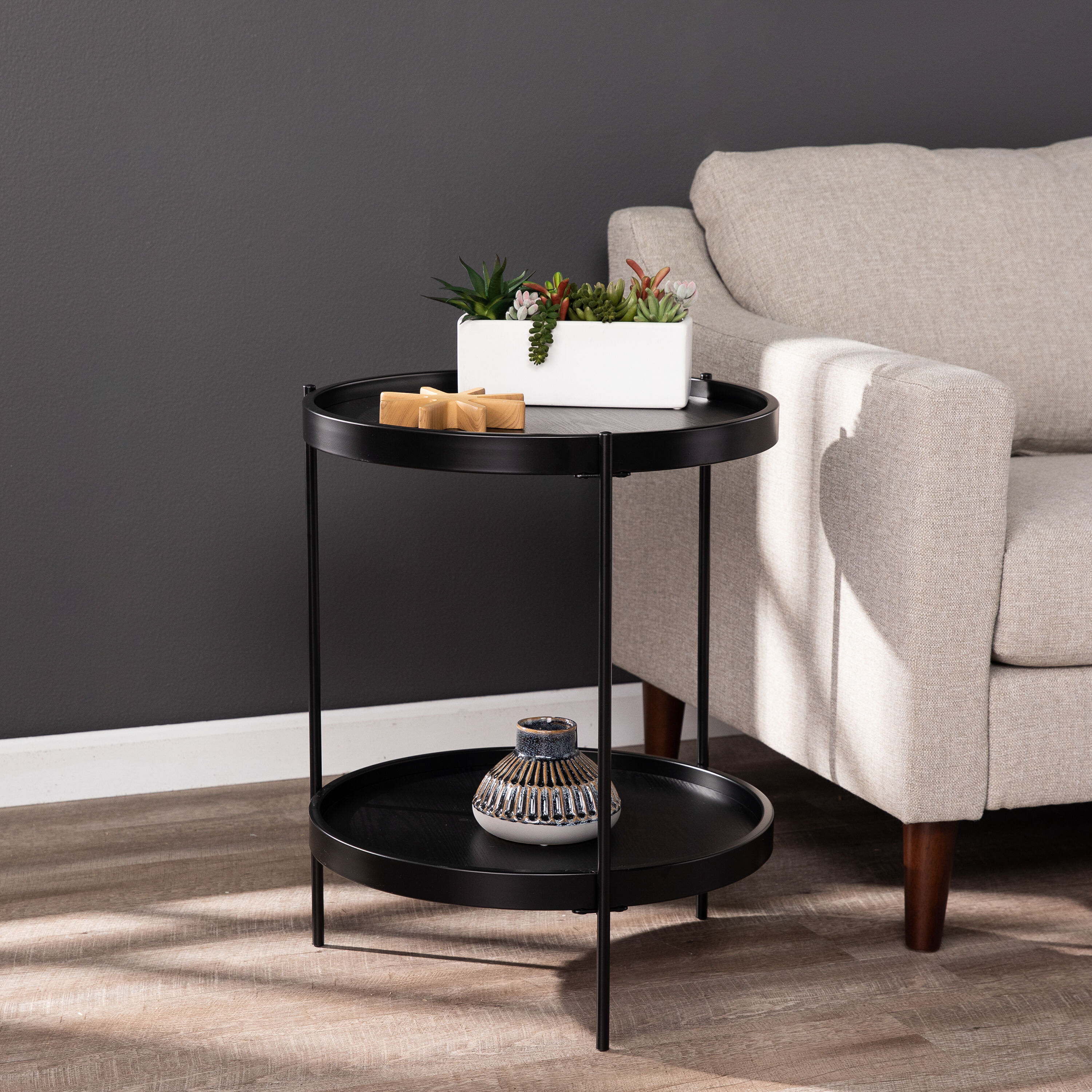 Black side outlet table with shelf