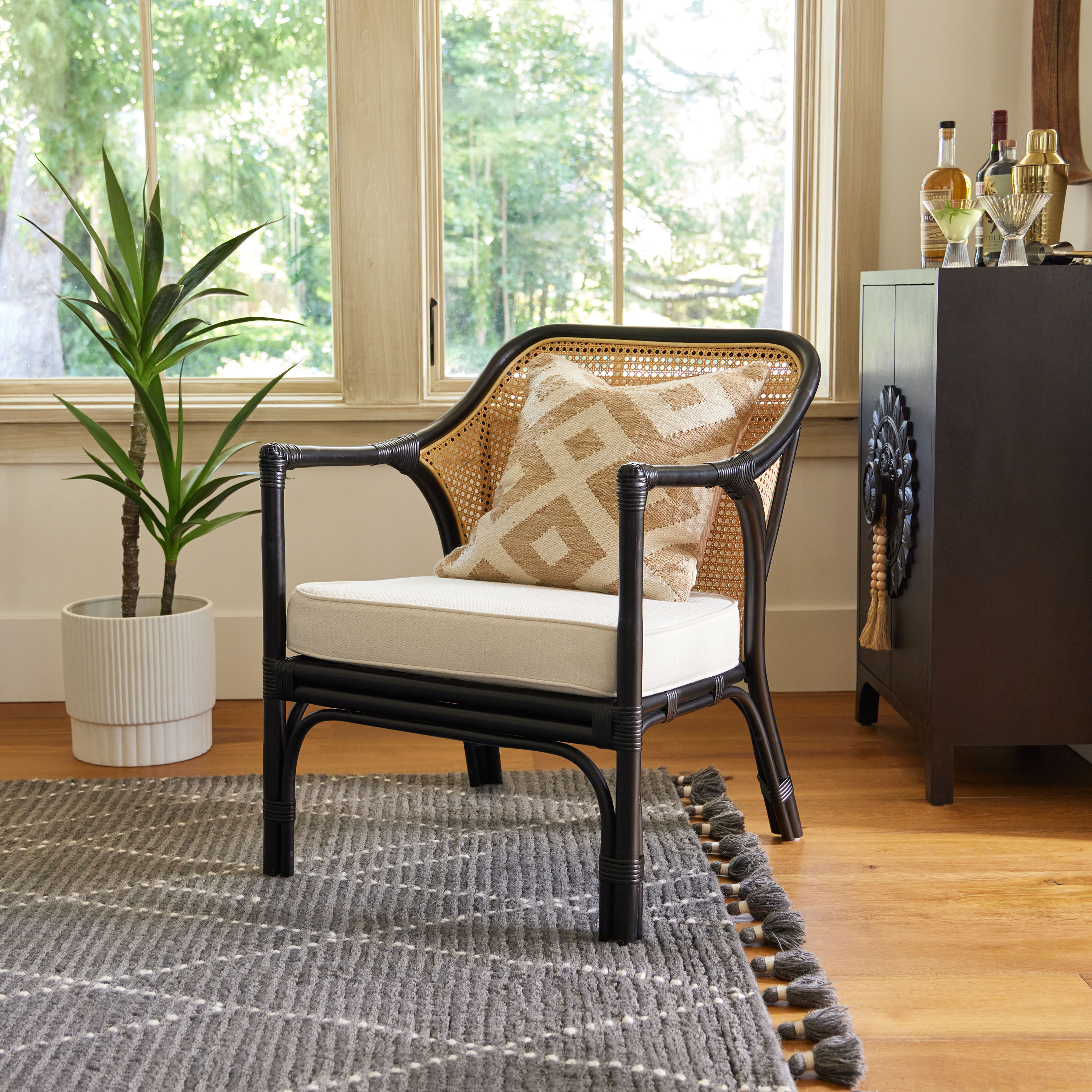 Lisette Black Rattan and Honey Cane Chair with Cushion