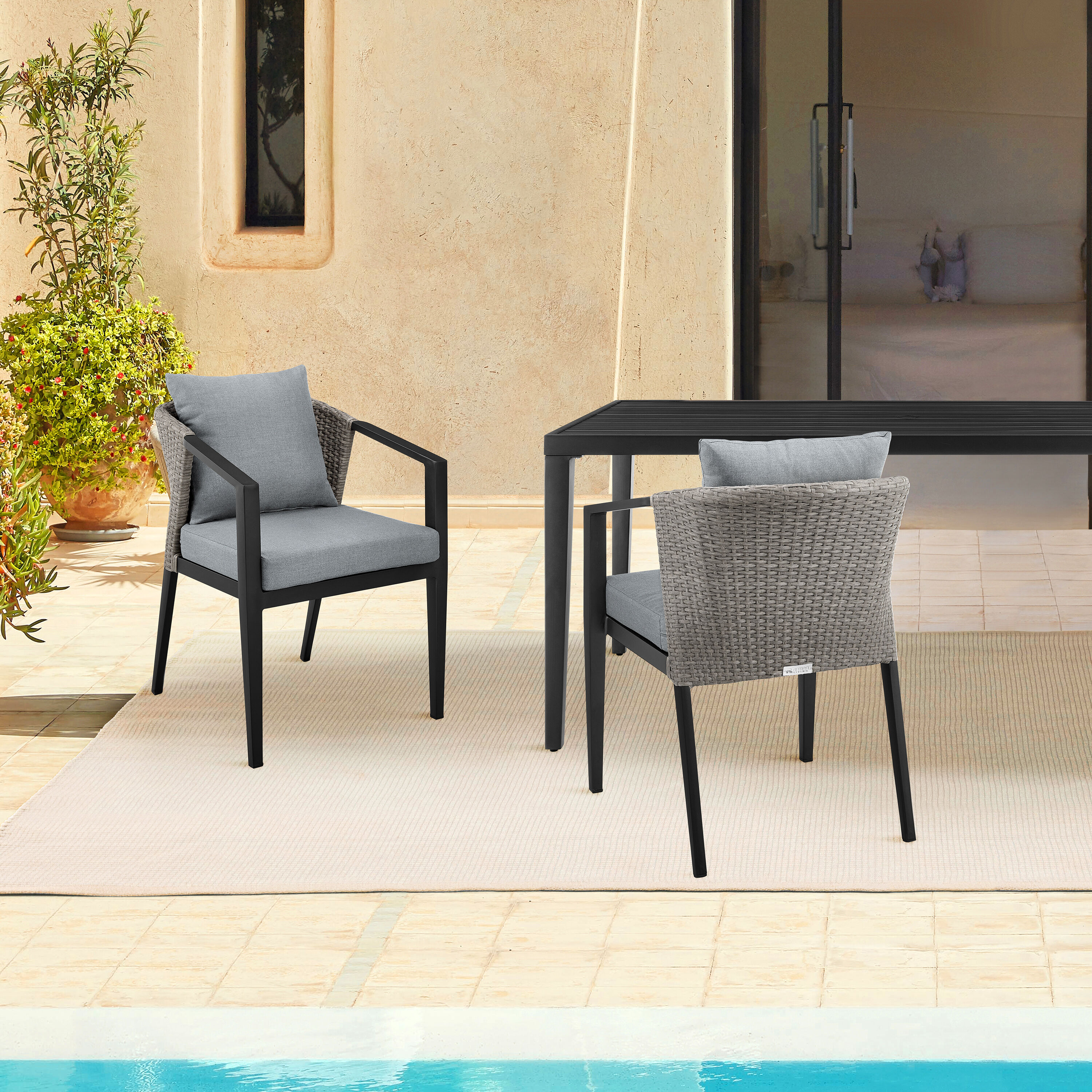 Cadiz Black Metal Outdoor Stacking Chair World Market