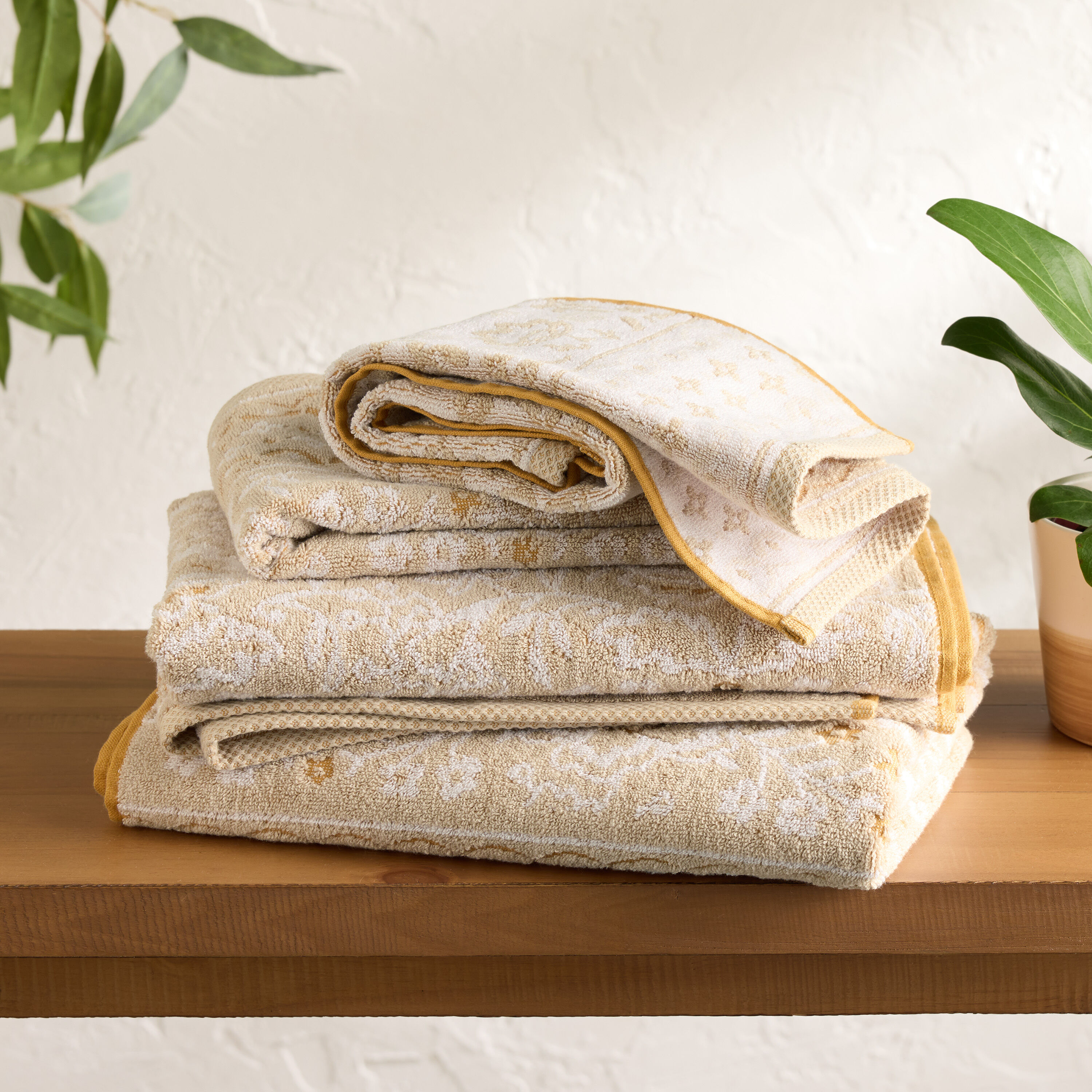 Gray and yellow paisley bath towels top